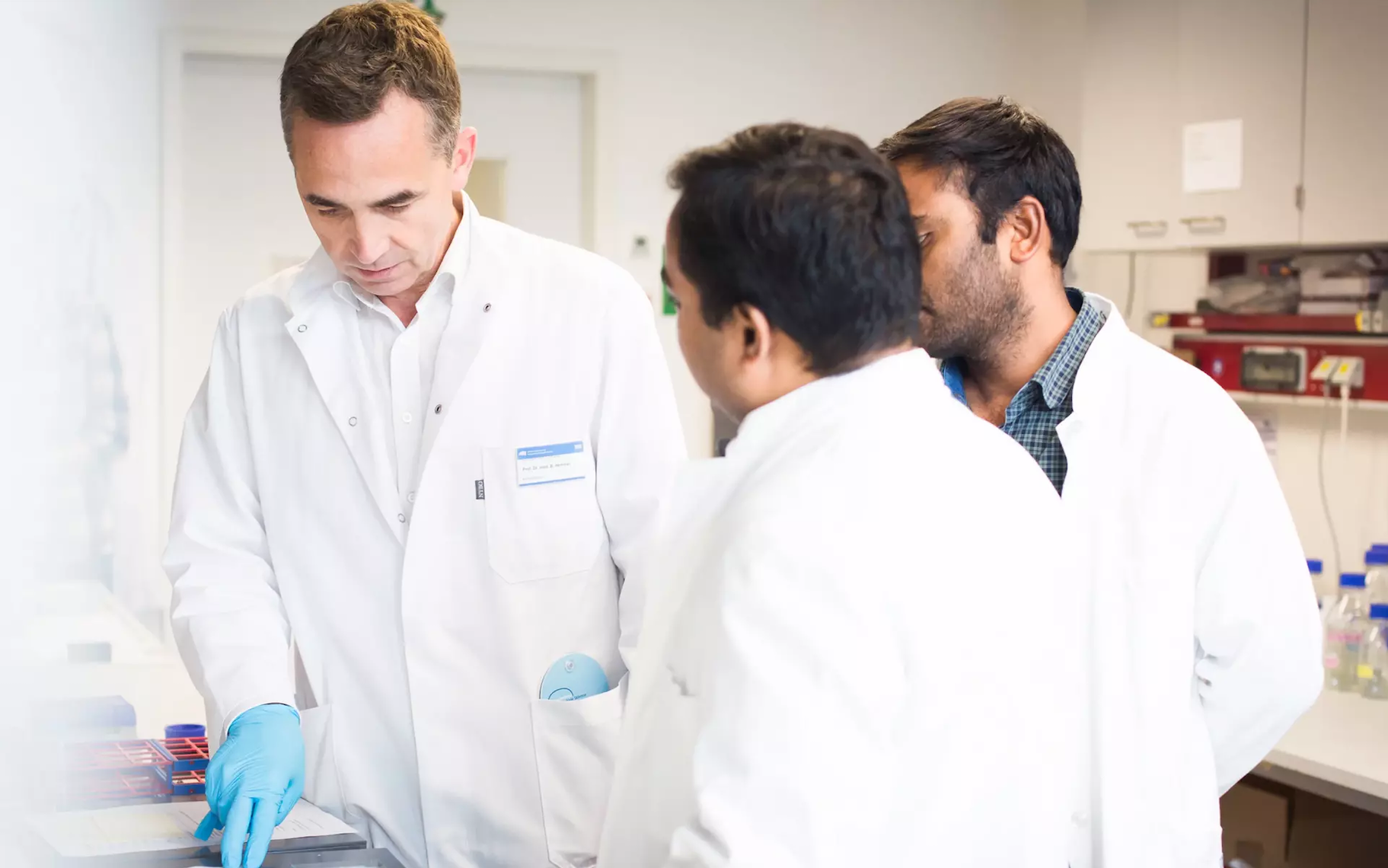  Bernhard Hemmer in the law with two colleagues at work