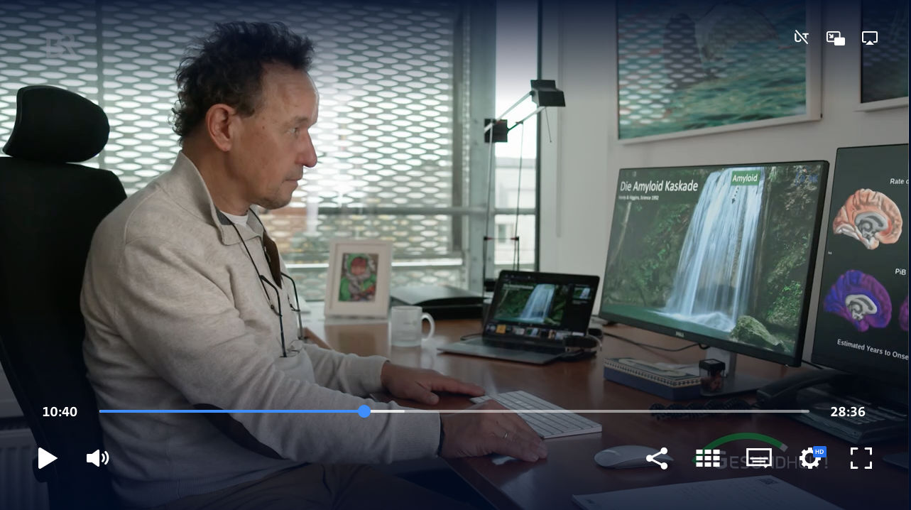  Christian Haass sitting behind his computer